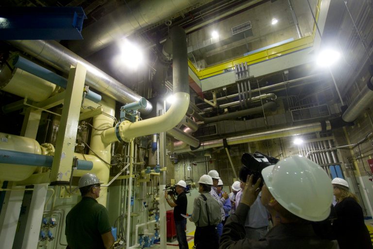 FILE - In this March 25, 2011 file photo, reporters and photographers view redundant cooling systems that can pump water into any of the three reactors at the Browns Ferry Nuclear Plant in Athens, Ala. It's a political role reversal: Republicans are blasting a plan by President Barack Obama to consider selling the Tennessee Valley Authority, a New Deal-era agency long targeted by conservatives as an example of government overreach. (AP Photo/Dave Martin, File)