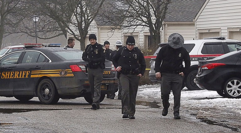 Police investigate the scene of a shooting in Westerville, Ohio. (Tom Dodge/The Columbus Dispatch via AP)