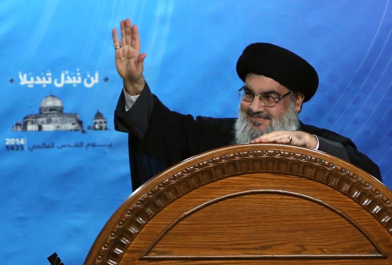 Hezbollah leader Sheik Hassan Nasrallah speaks during a rally to mark Jerusalem Day or Al-Quds day, in the southern suburb of Beirut, Lebanon, Friday, July 25, 2014. Nasrallah said that the 