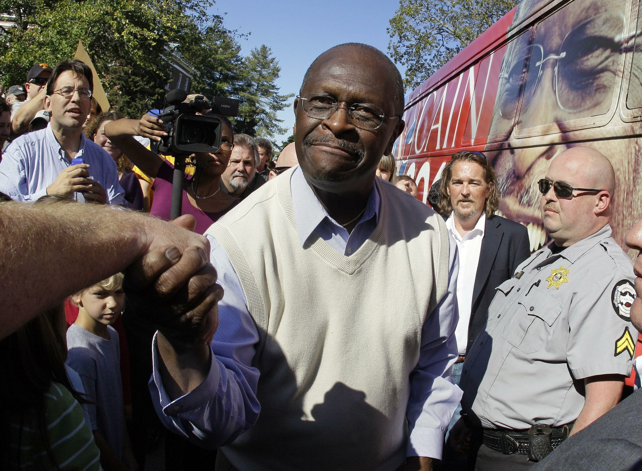 All eyes on Cain in latest GOP debate