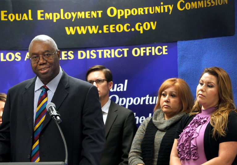   Olophius Perry, District Director, EEOC Los Angeles District Office, talks during a news conference in Los Angeles Tuesday, Dec.18, 2012. Department store chain Dillard's Inc. is paying $2 million to settle charges that it illegally required workers who took sick leave to reveal confidential medical information. The settlement, announced Tuesday by the Equal Employment Opportunity Commission, resolves a four-year-old class action lawsuit that charged Dillard's with violating the Americans with Disabilities Act. (AP Photo/Nick Ut)  