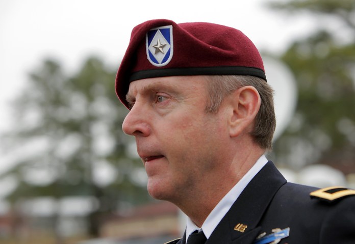 FILE - This March 19, 2014 file photo shows Brig. Gen. Jeffrey Sinclair at Fort Bragg, N.C. The Army is stripping a brigadier general at the center of a sexual misconduct case by two grades for his retirement, in a rare move that will slash his benefits and force him to retire as a lieutenant colonel. Army Secretary John McHugh announced the decision Friday, saying that Sinclair "displayed a pattern of inappropriate and at times illegal behavior both while serving as a brigadier general and a colonel."  (AP Photo/Ted Richardson, File)
