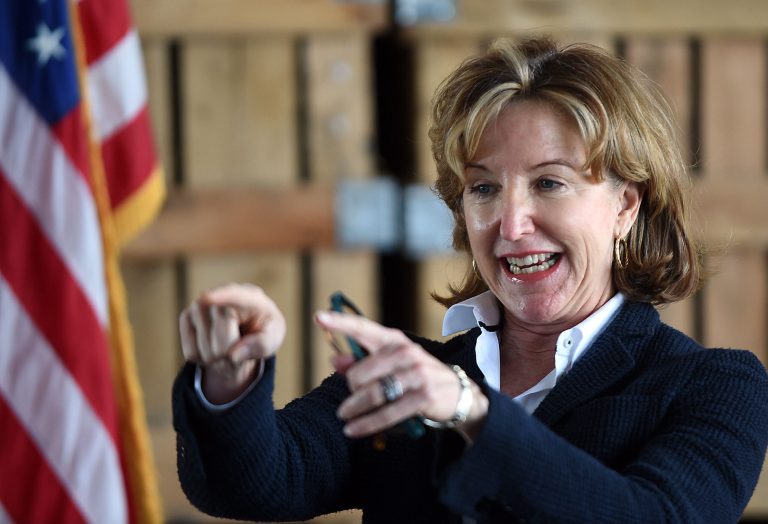 U.S. Sen. Kay Hagan talks to supporters during a campaign stop at Sharp Farms in rural Wilson County, N.C., Tuesday, Oct. 21, 2014. Hagan the Democratic incumbent will face Thom Tillis in November's general election. (AP Photo/The Wilson Times, Brad Coville)
