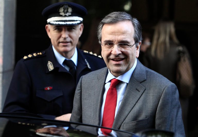 Greece's Prime Minister Antonis Samaras leaves the Finance Ministry after a meeting on cutting red tape for businesses in Athens, Monday, Feb. 17, 2014. Samaras has said that after years of deficits, Greece will post a euro1.5 billion ($ 2 billion) primary surplus in 2013, and in 2014 the country is expected to return to growth after a six-year recession. But unemployment remains at record high levels, reaching a staggering 28 percent in November. (AP Photo/Thanassis Stavrakis)