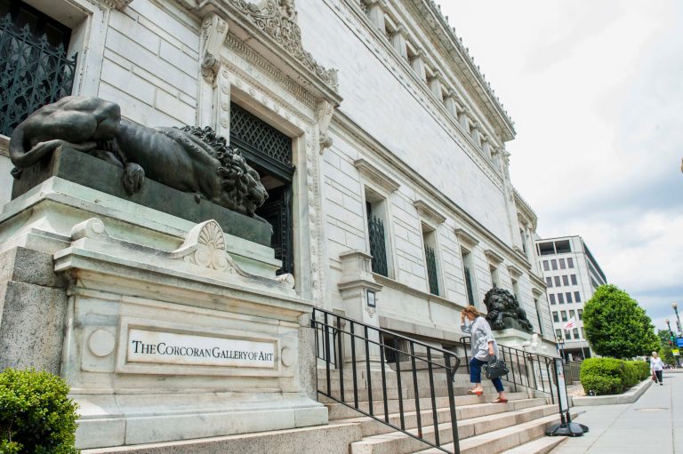 FILE - This May, 2014 file photo shows the entrance of the Corcoran Gallery of Art in Washington.  Nine current students, faculty and staff members can argue against the proposed merger of the Corcoran Gallery of Art, one of the nation's oldest museums, and its college with two larger institutions in Washington, a judge ruled Monday.   (AP Photo/Kevin Wolf)
