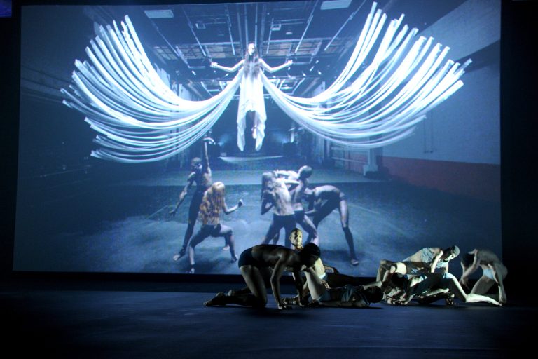 Designer Gareth Pugh presents his Spring 2015 collection with dancers and video displays during New York Fashion Week, Thursday, Sept. 4, 2014.  (AP Photo/Diane Bondareff)