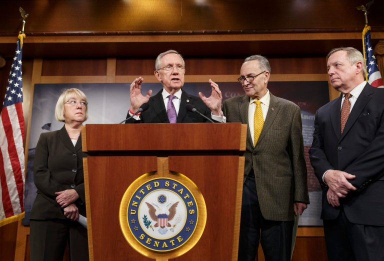 From left, Sen. Patty Murray, D-Wash., chair of the Senate Budget Committee, Senate Majority Leader Harry Reid, D-Nev., Sen. Chuck Schumer, D-N.Y., and Senate Majority Whip Dick Durbin, D-Ill., talk to reporters about the final work of the Senate as their legislative year nears to a close, at the Capitol in Washington, Thursday, Dec. 19, 2013. Reid promises a vote no later than Jan. 7 on a measure to extend jobless benefits for three months. He said the number of jobless people out of work for more than six months is far greater than in past economic recoveries. (AP Photo/J. Scott Applewhite)