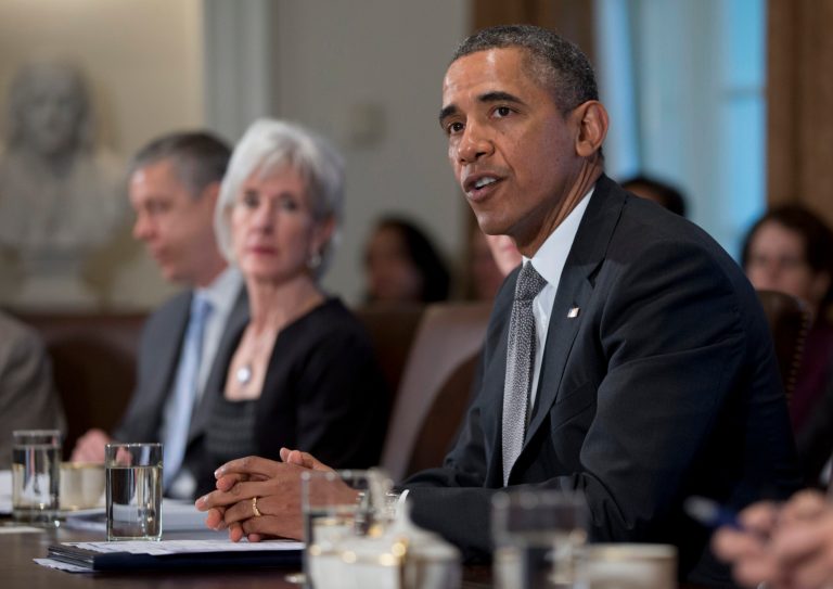 President Barack Obama speaks to the media before meeting his Cabinet meeting, Tuesday, Jan. 14, 2014, in the Cabinet Room of the White House in Washington. From left are, Education Secretary Arne Duncan, and Health and Human Services Secretary Kathleen Sebelius.  (AP Photo/Carolyn Kaster)