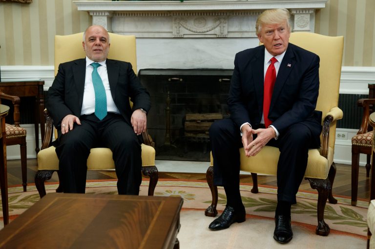 Iraqi Prime Minister Haider al-Abadi joked to President Trump during an Oval Office meeting on Monday afternoon that his country was not involved in the alleged wiretapping of the GOP candidate's campaign last fall. (AP Photo/Evan Vucci)