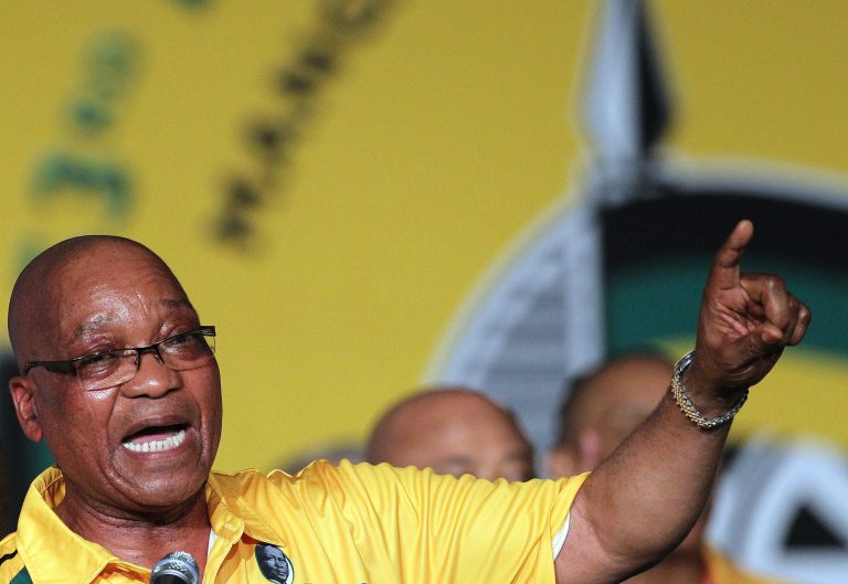   The ruling party African National Congress (ANC) president Jacob Zuma sings before addressing delegates during the opening of their elective conference at the University of the Free State in Bloemfontein, South Africa, on Sunday, Dec. 16, 2012. Zuma acknowledged Sunday that corruption and violence have marred the image of his African National Congress as it changed from a liberation movement to governing party, but called on members to again support him to be its leader. (AP Photo/Themba Hadebe)  