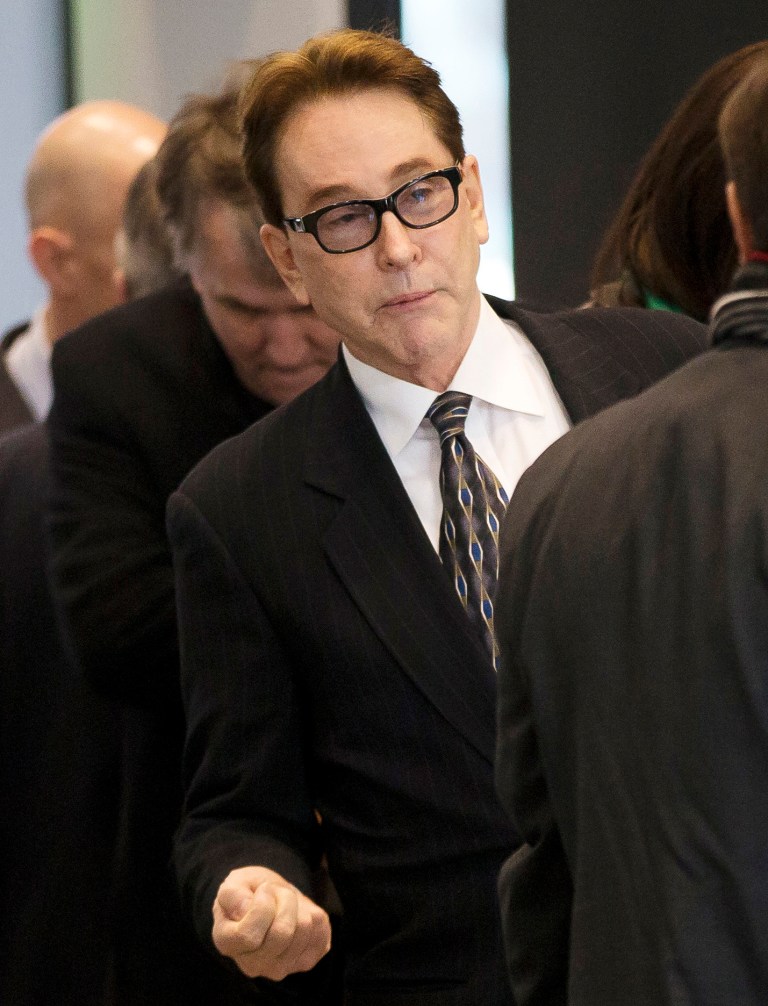 FILE - In this Jan. 14, 2014 file photo, Ty Warner, the billionaire who created Beanie Babies, arrives at federal court where he was sentenced to community service but no prison time for hiding at least $25 million from U.S. tax authorities in Swiss bank accounts. On Wednesday, Sept. 17, 2014, a three-judge appellate panel at the U.S. 7th Circuit Court of Appeals in Chicago is scheduled to hear arguments from prosecutors who say Warner's punishment was way too lenient and from defense attorneys who say it was just right. (AP Photo/Andrew A. Nelles, File)