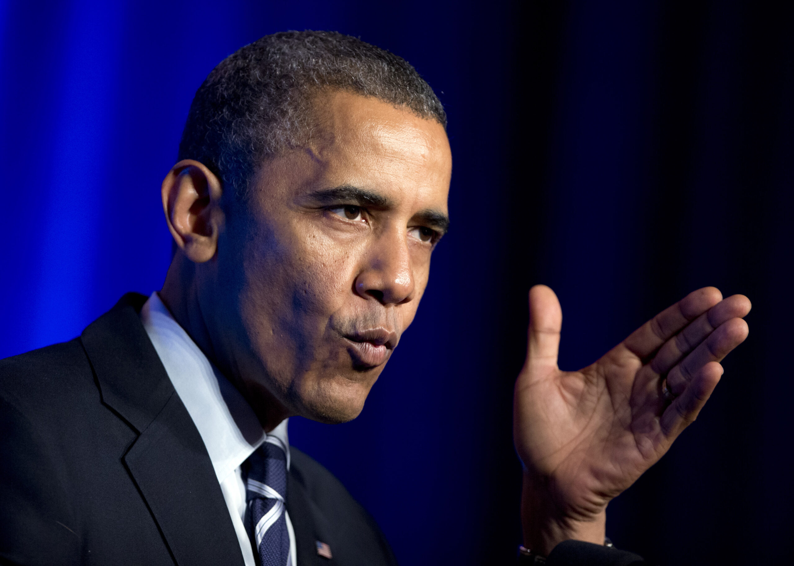 Obama supporting group cuts staffing, fundraising