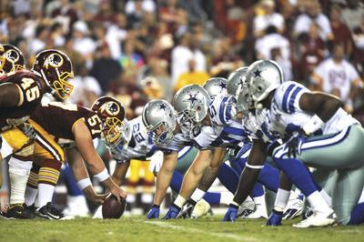 Larry French/Getty Images
The rivalry between the Redskins and Cowboys has spanned 50 years and the hatred between the two NFC East foes still resonates with the teams'current rosters.