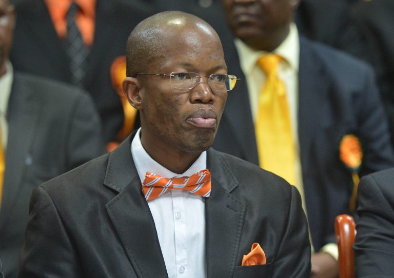 In this photo taken Friday, June 6, 2014 opposition leader of the Umbrela for Democratic Change (UDC)  party, Gomolemo Motswaledi pauses, during the UDC election manifesto launch in Gaborone. His death on  July 30, 2014, in a road accident, of Motswaleda, has highlighted brewing tension in Botswana, with the opposition alleging that Motswaledi may have been assassinated by pro-government agents.  (AP Photo/Monirul Bhuiyan)