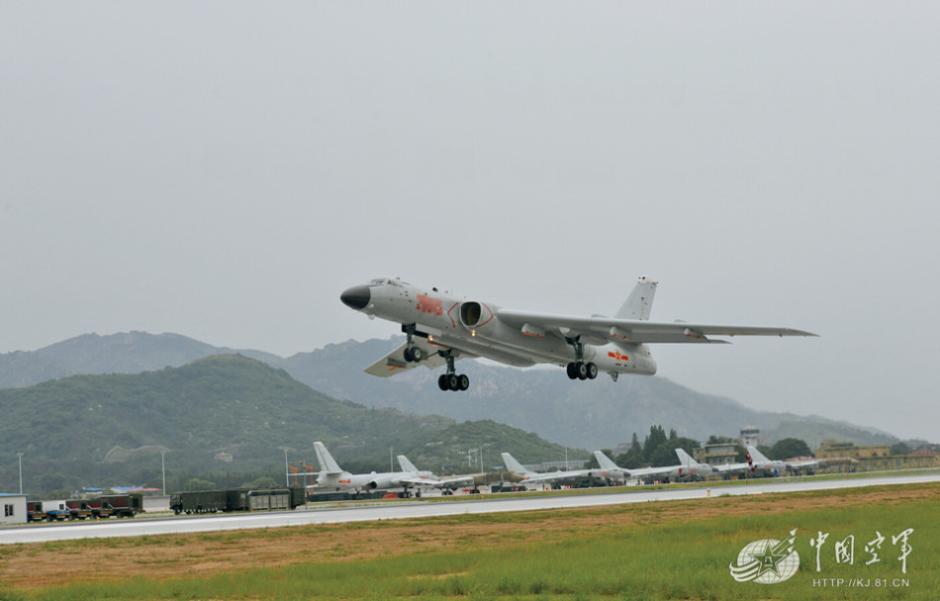 Taiwan says China is flexing its muscles with bomber flight