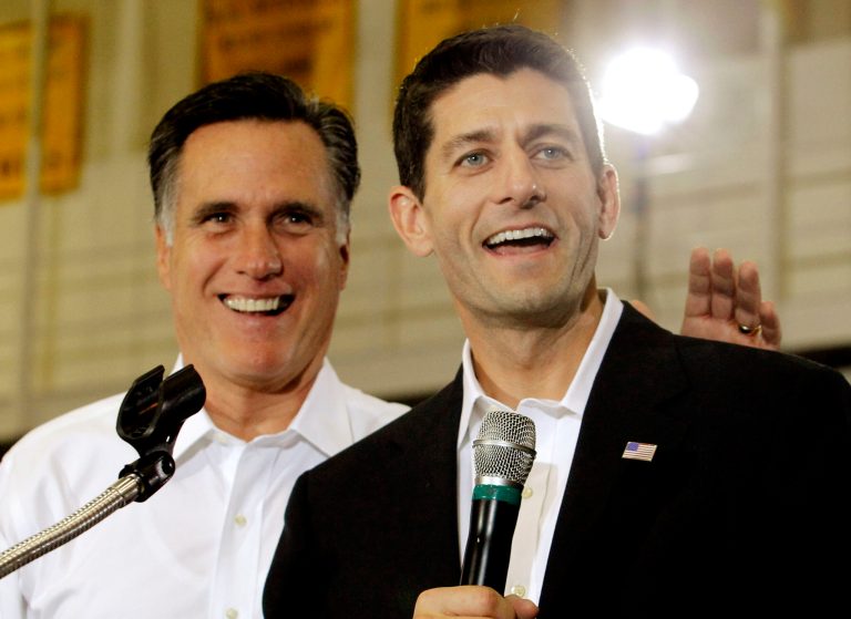 Republican Presidential candidate Mitt Romney, left, points to a supporter in the crowd as his running mate, Rep. Paul Ryan, R-Wis. looks on during a rally at Randolph-Macon College in Ashland, Va., Saturday, Aug. 11, 2012.  (AP Photo/The Richmond Times-Dispatch, Joe Mahoney)