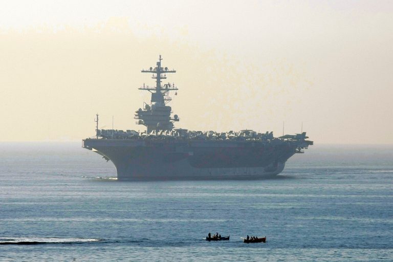 Iran's fast-attack vessels can't match the firepower of a U.S. warship, but they still approached to within a thousand yards of the aircraft carrier USS George H.W. Bush and four other ships. (AP Photo/Claude Paris)