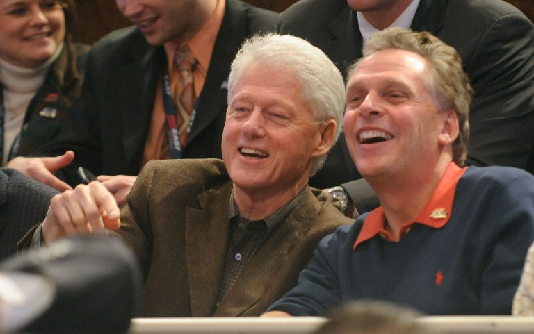 Democrat Terry McAuliffe, right, received $5.1 million in campaign contributions in the first three months of the year, including a $100,000 donation from former President Clinton. (AP Photo/Henny Ray Abrams)