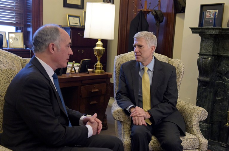 Sen. Bob Casey, Jr., D-Pa., left, talks with Supreme Court Justice nominee Neil Gorsuch on Capitol Hill in Washington, Thursday, Feb. 16, 2017. Casey was one of a handful of Democrats targeted by Gorsuch supporters. (AP Photo/Susan Walsh)