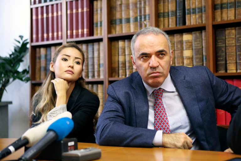 Russian chess master and political activist Garry Kasparov ponders a question as he sits with Kazakh banker Mukhtar Ablyazov's daughter Madina Ablyazova during a press conference in Paris, Thursday Oct. 16, 2014. Kasparov said  Mukhtar Ablyazov is in danger if a court rules he should be extradited from France. The case of Mukhtar Ablyazov has been tangled up in courts in at least five countries since he fled Kazakhstan amid the nationalization of BTA Bank, which he had led. Ablyazov is jailed in France as Russia and Ukraine seek his extradition over billions missing from the bank. He was arrested in France on an international warrant. (AP Photo/Remy de la Mauviniere)