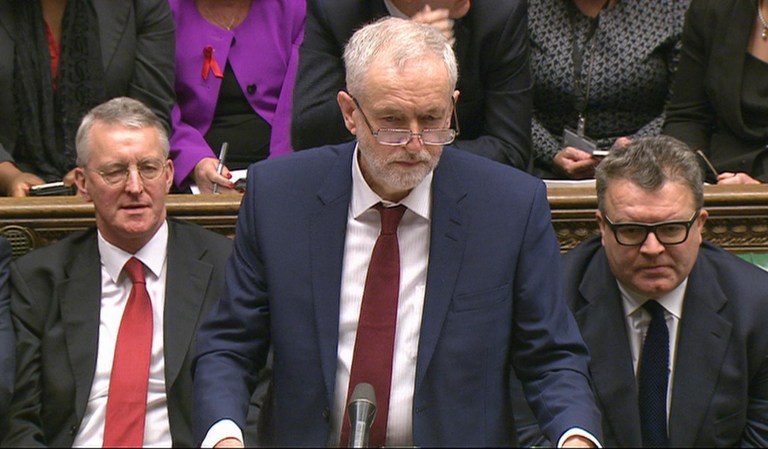 "He's welcome to come and see. He might learn something," Jeremy Corbyn said. (Parliamentary Recording Unit via AP Video)