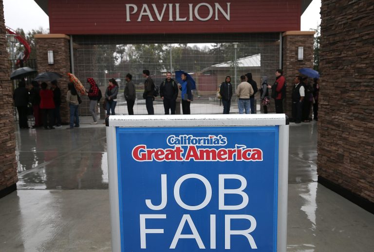 Job seekers wait in line to register for a job fair at California's Great America theme park on February 6, 2015 in Santa Clara, Calif. (Photo by Justin Sullivan/Getty Images)