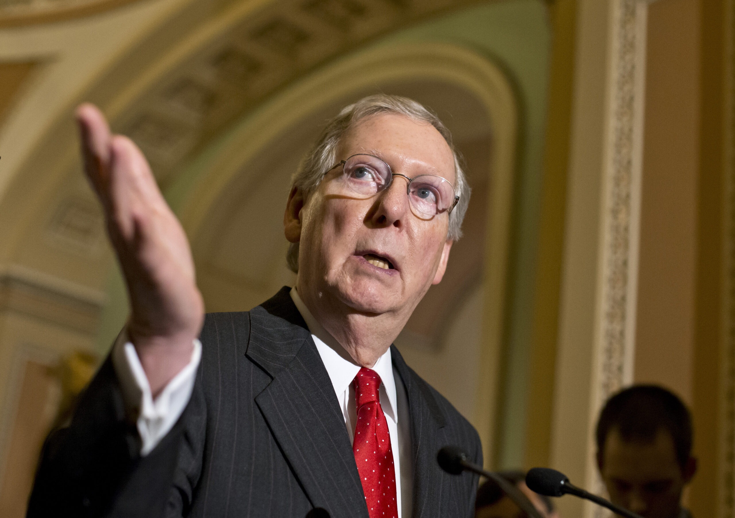 Conservative group presses McConnell on health law