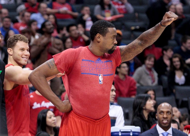   Los Angeles Clippers players Blake Griffin, left, and DeAndre Jordan have fun on the bench in the final minutes of the second half of their NBA basketball game against the Denver Nuggets, Tuesday, Dec. 25, 2012, in Los Angeles. The Clippers won 112-100. (AP Photo/Jason Redmond)  