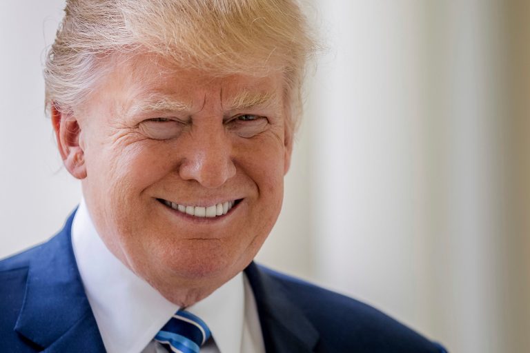FILE - In this April 21, 2017, file photo, President Donald Trump poses for a photograph on West Wing Colonnade at the White House in Washington. Trump has ripped up the playbook on avoiding conflicts of interest, and ethics experts are outraged. (AP Photo/Andrew Harnik, file)