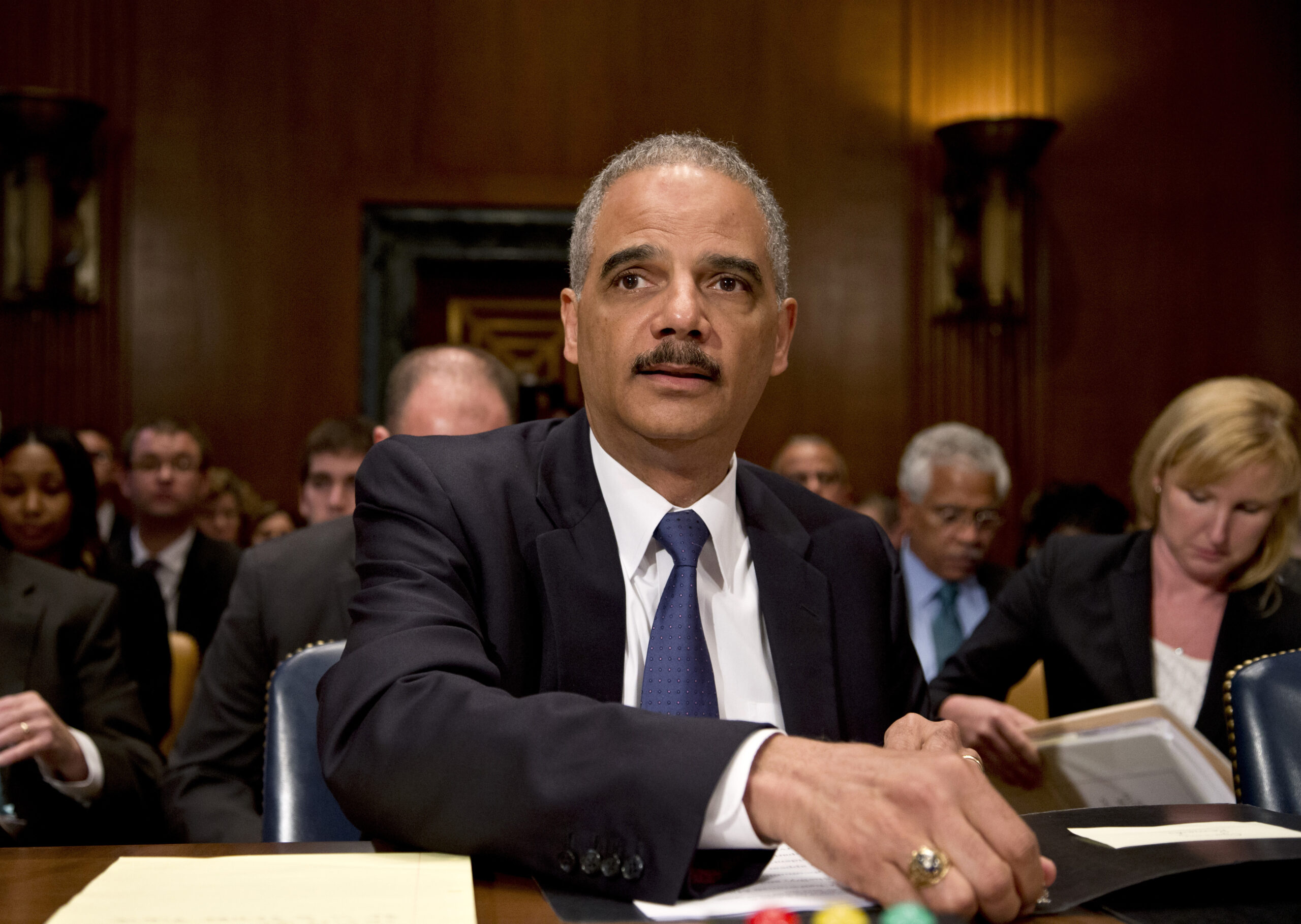 Gallup pays Eric Holder to go away