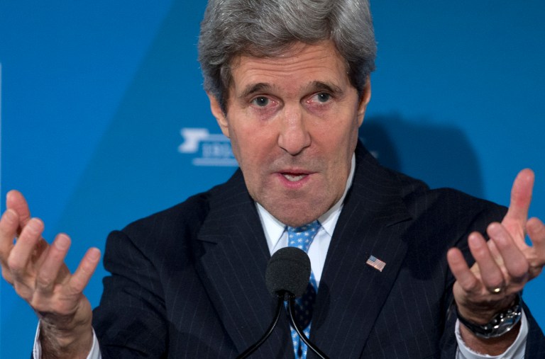 Secretary of State John Kerry gestures as he speaks at the opening dinner of the American Jewish Joint Distribution Committee (JDC) Centennial Celebration at the National Museum for Women in the Arts in Washington, Monday, Dec. 9, 2013. (AP Photo/Carolyn Kaster)
