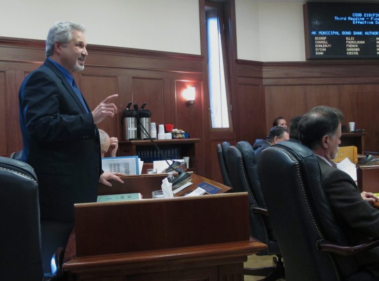 State Sen. Pete Kelly, R-Fairbanks, speaks on the floor of the Senate during discussion on a bill on the Alaska Municipal Bond Bank Authority on Friday in Juneau, Alaska. (AP Photo/Becky Bohrer)