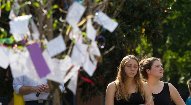 The university sent the alert about 10:11 p.m. Monday, warning students to avoid a part of campus where a police vehicle had been set on fire. (Steve Schaefer/Atlanta Journal-Constitution via AP)