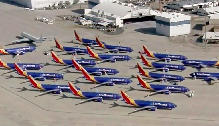 This Monday, March 25, 2019, image made from a video provided by KCAL9/CBSLA shows several Southwest Airlines Boeing 737 Max planes parked at the airport in Victorville, Calif.