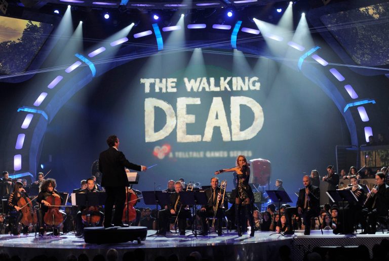   An orchestra performs the musical themes for game of the year nominees on stage at Spike's 10th Annual Video Game Awards at Sony Studios on Friday, Dec. 7, 2012, in Culver City, Calif. (Photo by Chris Pizzello/Invision/AP)  