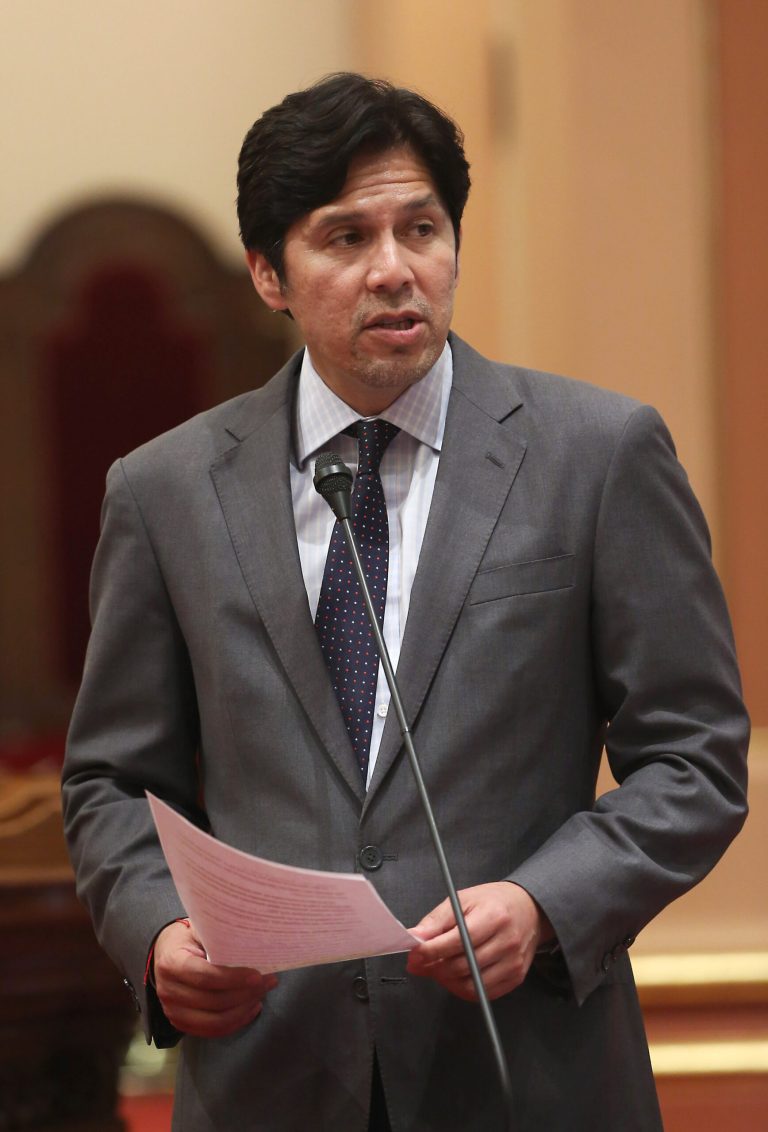 State Sen. Kevin de Leon, D-Los Angeles, urged lawmakers to approve a measure that provides restitution for a man whose murder charge was dropped after he spent a decade in prison, at the Capitol in Sacramento, Calif., Monday, June 39, 2014.  By a 27-3 vote, the Senate approved SB1031, which authorized $305,900 for Mario Rocha whom De Leon said was wrongfully convicted in 1997 of participating in a gang shooting at age 16.  The bill was sent to the Assembly.(AP Photo/Rich Pedroncelli)