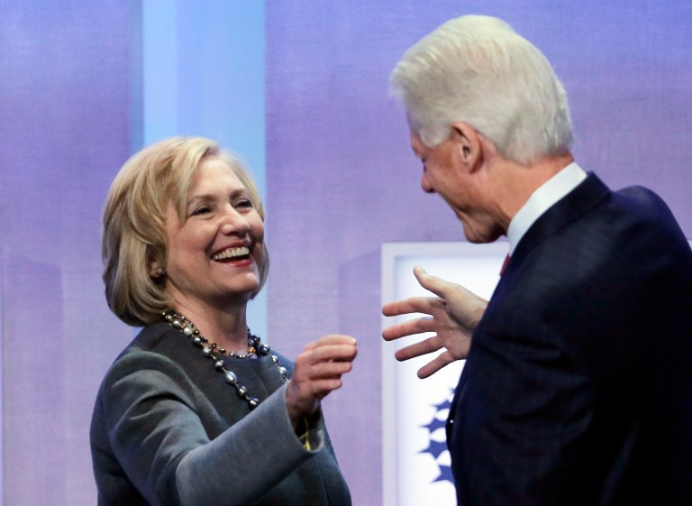 Bill Clinton's favorability rating has dropped but he is still more popular than his wife. (AP Photo/Mark Lennihan)