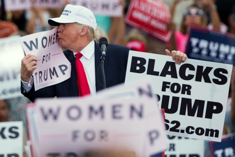 A former People magazine reporter claims Donald Trump forced himself on her when she went to interview him in 2005 at his Mar-a-Lago resort in Florida. (AP Photo/ Evan Vucci)