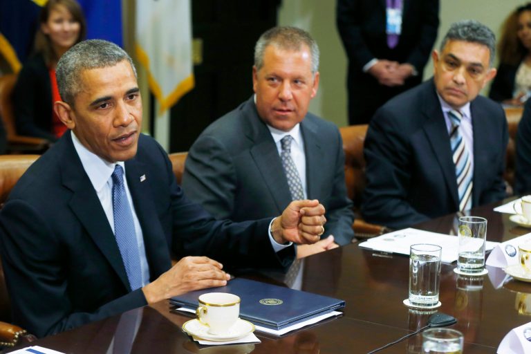 President Barack Obama meets with business leaders about creating and investing in jobs in the U.S., Tuesday, May 20, 2014, in the Roosevelt Room at the White House in Washington. From left are: the president; Joe Hinrichs, executive vice president and president of the Americas, Ford Motor Company; and Sanjay K. Jha, CEO, Globalfoundries. (AP Photo/Charles Dharapak)
