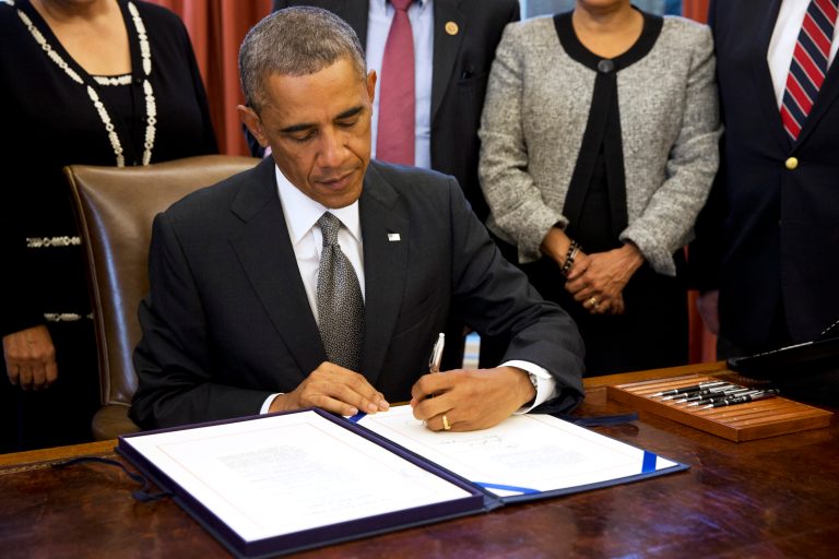 President Obama signed an executive order Friday requiring all government-issued credit and debit cards to use microchips instead of magnetic strips as part of an effort to prevent identity theft.Â (AP Photo/Jacquelyn Martin)