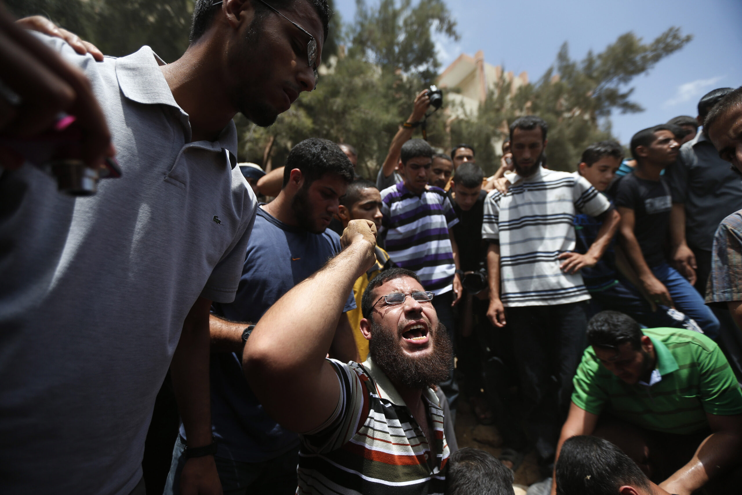 Israeli strike kills 18, stirs debate over targets