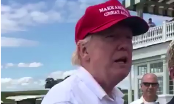 Video Saturday shows President Trump, who is just beginning his August vacation, asking a group of people if they are enjoying themselves. (Screen shot)