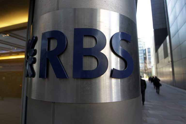   In this Friday, Jan. 27, 2012 photo, a sign of RBS, Royal Bank of Scotland, is seen at its office in the City of London. The value of global mergers and acquisitions deals in 2012 was nearly half the amount made five years ago, when the global financial crisis was first baring its teeth, a leading accounting and consulting firm said Wednesday, Dec. 12, 2012. There were a little under 37,000 deals worldwide, around 9,000 less than in 2007, when many companies indulged in a feverish bout of deal-making, many of which led to their financial ruin. Much of the blame for Royal Bank of Scotland PLCâs near-collapse in 2008, which eventually required a government bailout, was due to its over-priced purchase of a large chunk of Dutch bank ABN Amro the year before. (AP Photo/Sang Tan)  