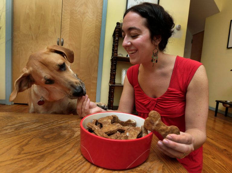   In this Saturday, Dec. 15, 2012 photo, New York pet columnist for the magazine 