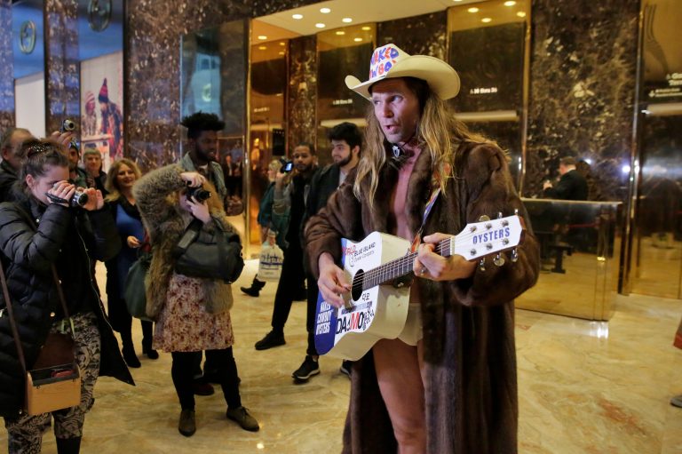 The moment was immortalized on CSPAN's Trump Tower lobby cam. (AP Photo/Richard Drew)