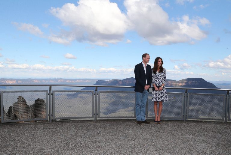 Britain's Prince William and his wife Kate, the Duchess of Cambridge pose for a photo at Echo Point Lookout in Katoomba,  Australia, Thursday, April 17, 2014. The Duke and Duchess of Cambridge on Thursday stopped in the Blue Mountains town of Winmalee to meet with firefighters and locals affected by last year's wildfires that destroyed more than 200 homes. (AP Photo/Rob Griffith)