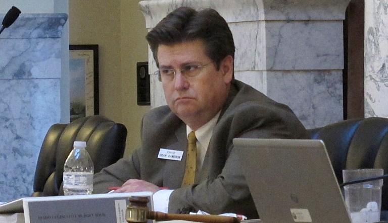 Idaho's insurance director, Dean Cameron, said the uncertainty is leading to price increases. (AP Photo/Kimberlee Kruesi)