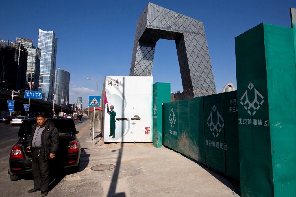 China’s economy grows 7.7 percent in 2013