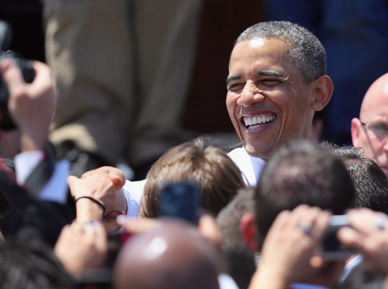 MIAMI, FL - MARCH 29:  President Barack Obama greets people during an event at PortMiami on March 29, 2013 in Miami, Florida. The president spoke about road and bridge construction during the event at the port in Miami, where he also toured a new tunnel project.  (Photo by Joe Raedle/Getty Images)