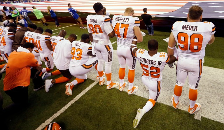 FILE - In this Sunday, Sept. 24, 2017, file photo, members of the Cleveland Browns take a knee during the national anthem before an NFL football game against the Indianapolis Colts in Indianapolis. (AP Photo/Michael Conroy, File)